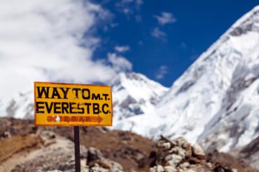 Wooden trail sign board showing directions on the Everest Base Camp trekking route