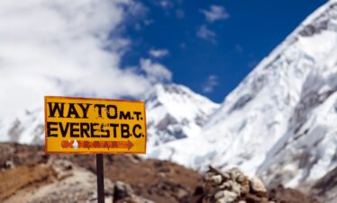 Wooden trail sign board showing directions on the Everest Base Camp trekking route