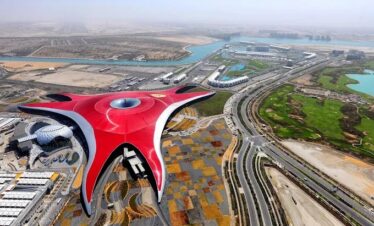 Aerial view of Ferrari World Abu Dhabi with iconic red roof design