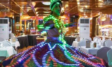 Entertainment show on a Dubai Marina dhow cruise with traditional dance performance