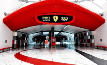 Exterior view of Ferrari World Abu Dhabi entrance with red Ferrari logo