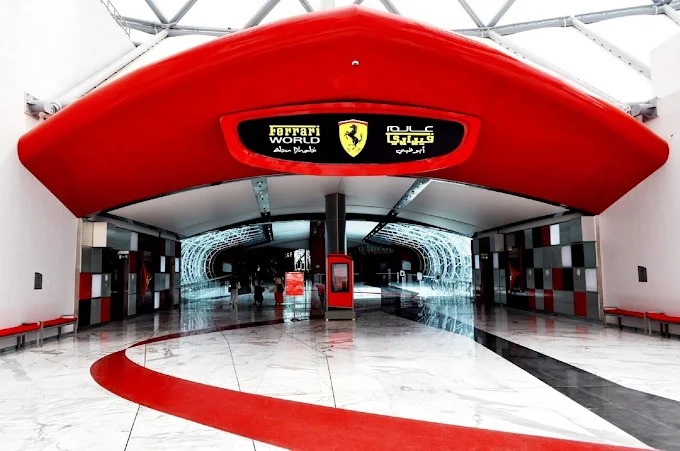 Exterior view of Ferrari World Abu Dhabi entrance with red Ferrari logo