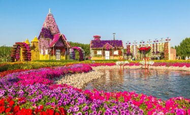 Panoramic view of Dubai Miracle Garden with walking pathways surrounded by flowers